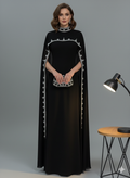 Das verzierte Umhangkleid