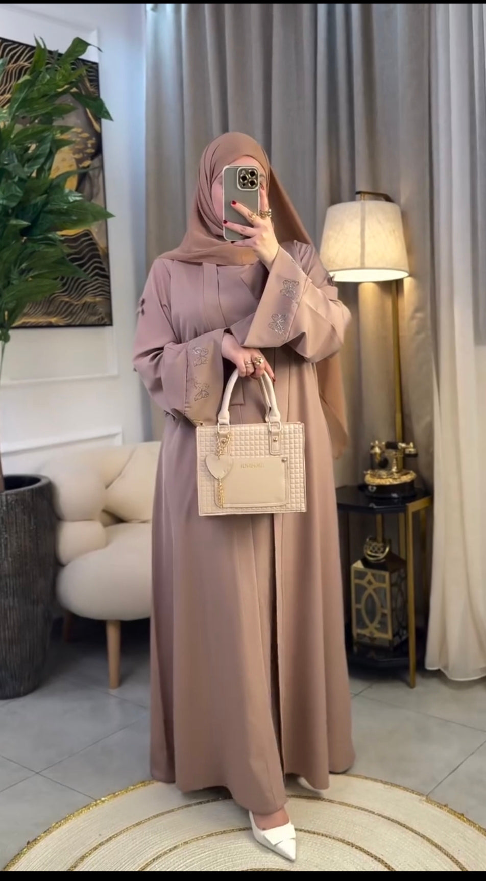 Woman wearing multiple colors available butterfly stone embellished abaya — embellished nida modest abaya by Rubab's Hijab