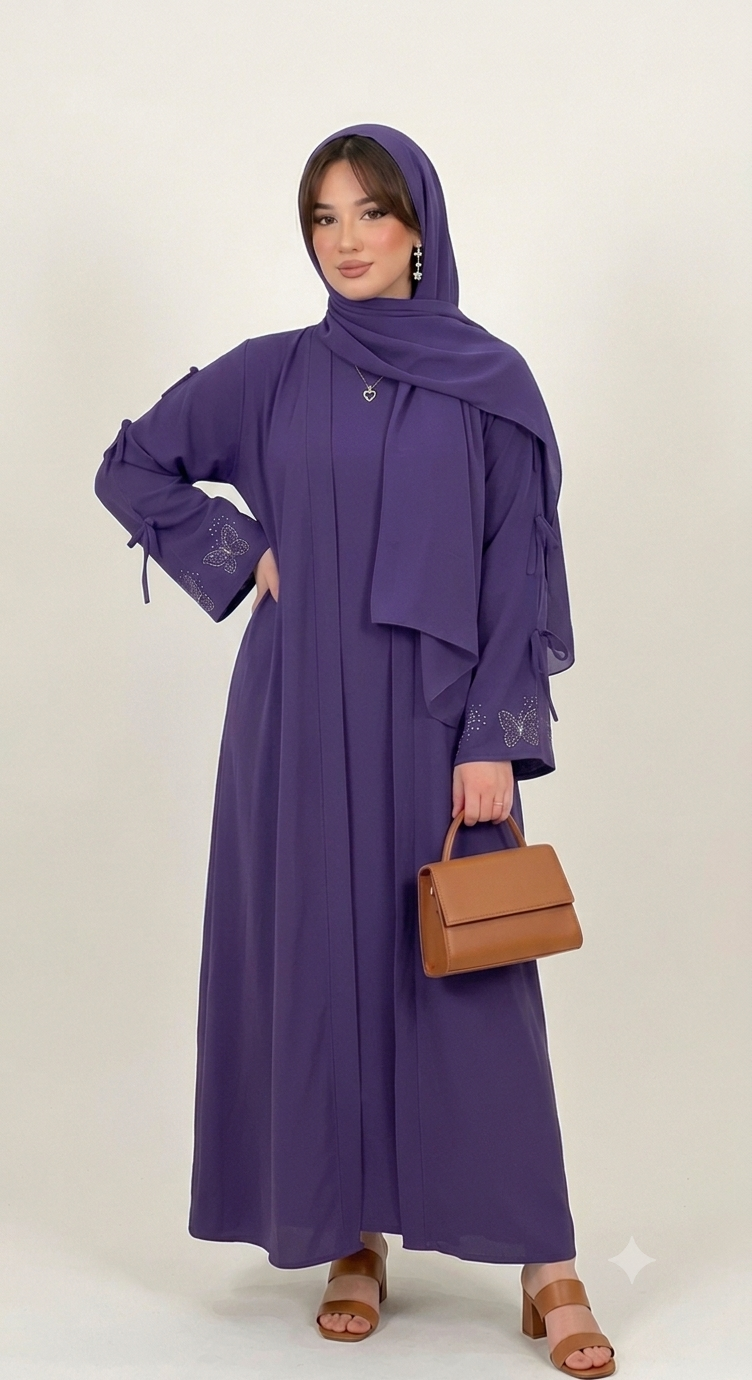 Woman wearing multiple colors available butterfly stone embellished abaya — embellished nida modest abaya by Rubab's Hijab
