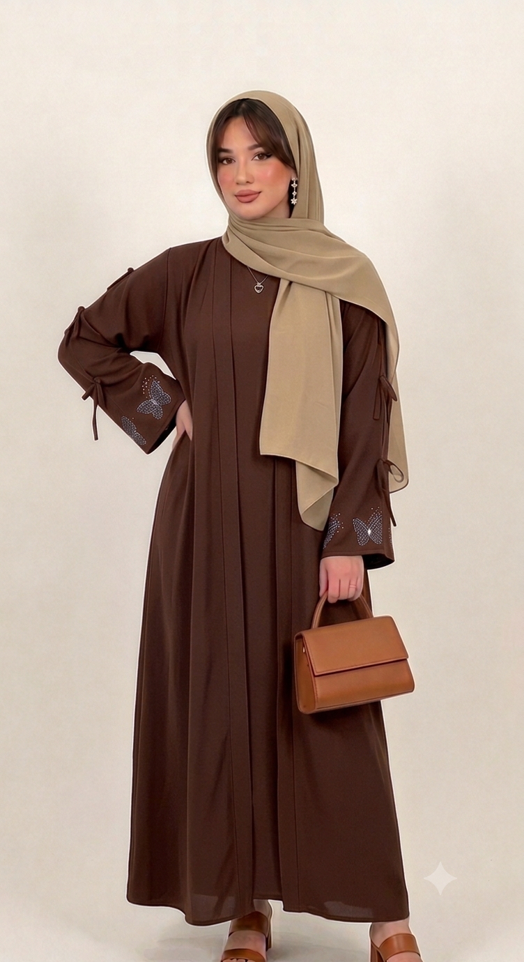 Woman wearing multiple colors available butterfly stone embellished abaya — embellished nida modest abaya by Rubab's Hijab