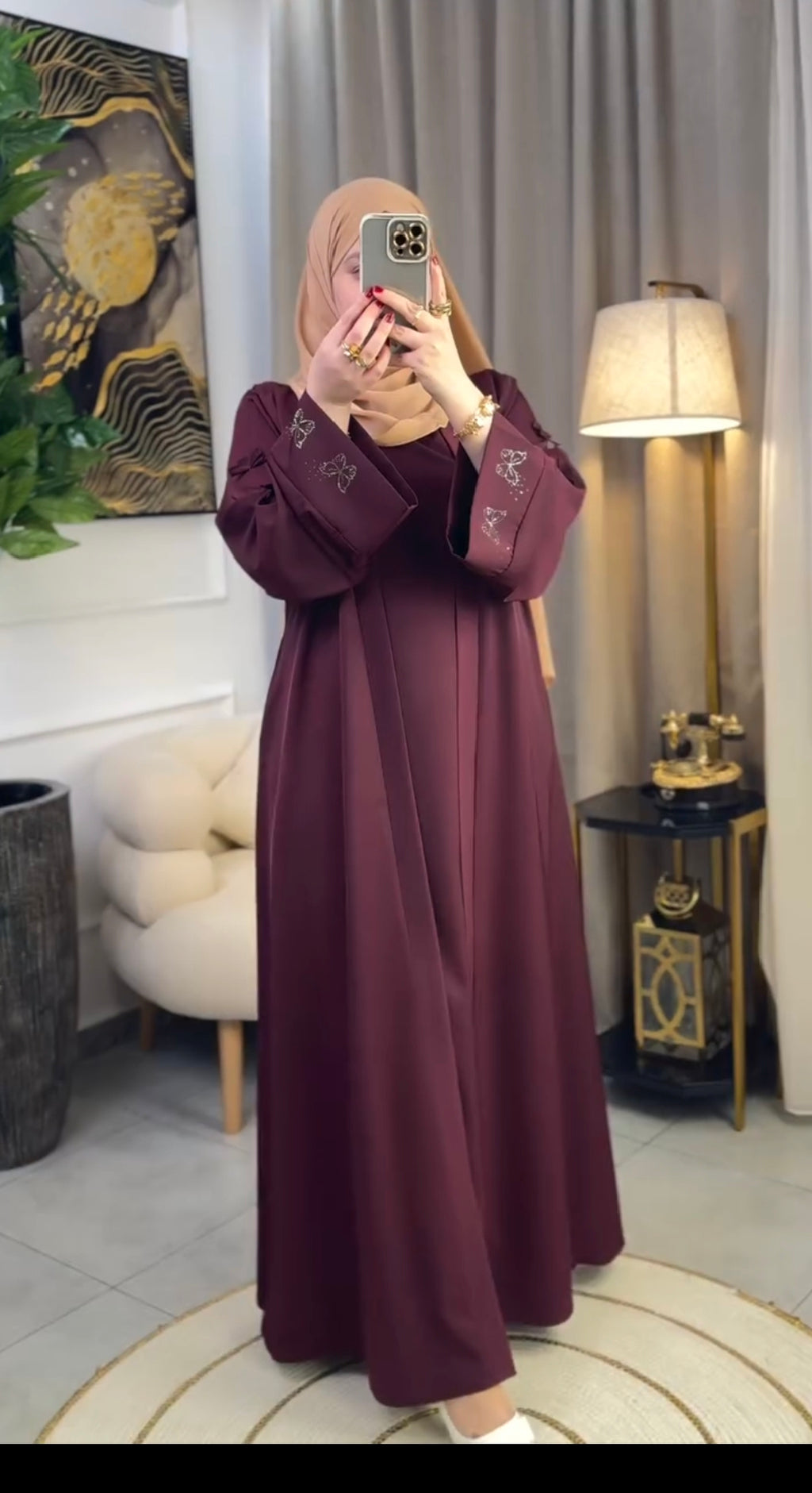 Woman wearing multiple colors available butterfly stone embellished abaya — embellished nida modest abaya by Rubab's Hijab